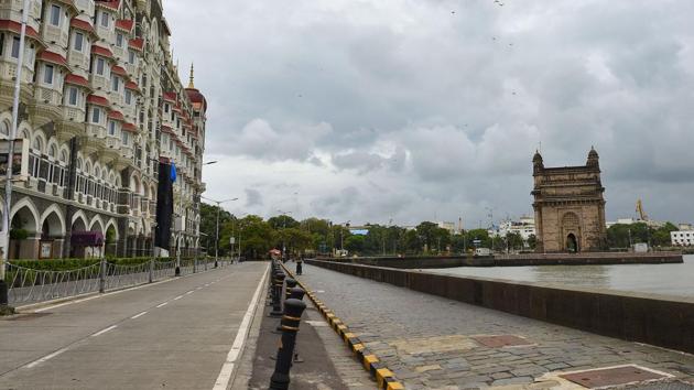 A deserted road leads up to the Gateway of India, in Mumbai on July 23. Maharashtra continues to grapple with the spread of Sars-Cov-2, four months after having entered a state of lockdown and then attempting gradual relaxations in attempts towards normalcy since June. The state remains the country’s worst affected region in terms of Covid-19 as of July 23. (Kunal Patil / PTI)