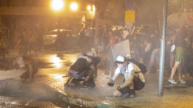 Police say they moved in to disperse the protesters when they tried to stage a procession through the city. (AP Photo) Police say they moved in to disperse the protesters when they tried to stage a procession through the city. (AP Photo)