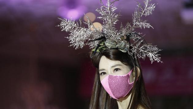 A model wearing a face mask poses during a mask fashion show amid the coronavirus pandemic in Seoul, South Korea, Friday, July 24, 2020. (AP)