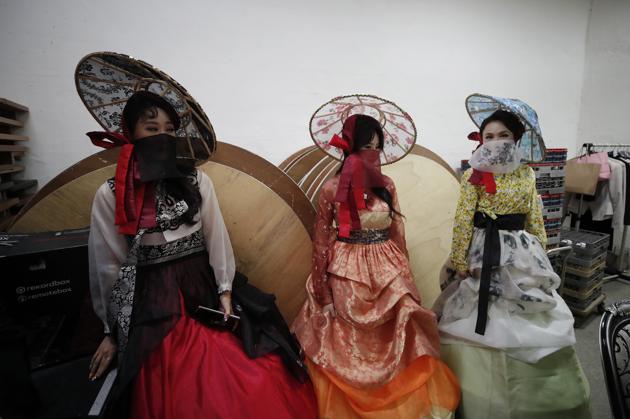 Models wait for their rehearsal before a face mask fashion show amid the coronavirus pandemic in Seoul, South Korea, Friday, July 24, 2020. (AP)