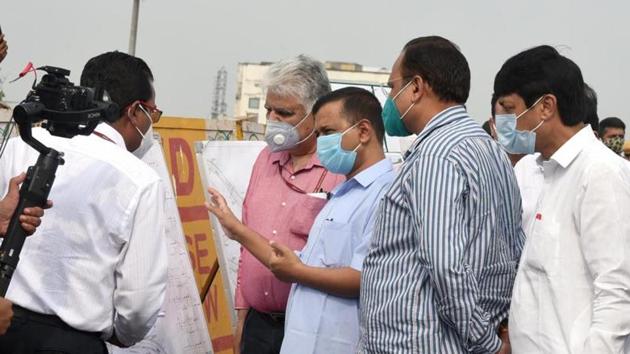 Delhi CM Kejriwal and PWD minister Satyendar Jain during an inspection at the flyover on Friday. (Sonu Mehta/HT PHOTO) Delhi CM Kejriwal and PWD minister Satyendar Jain during an inspection at the flyover on Friday. (Sonu Mehta/HT PHOTO)