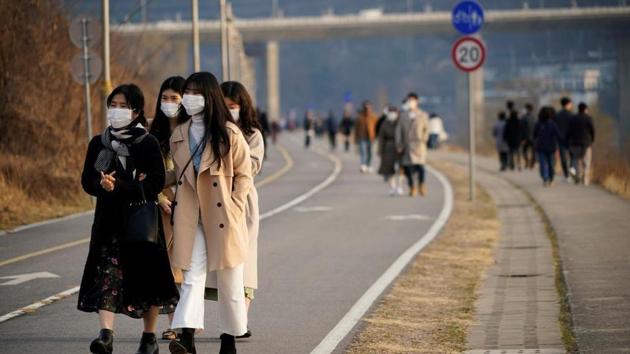 The figures released by South Korea’s Centers for Disease Control and Prevention Saturday brought the national caseload to 14,092, including 298 deaths.(Reuters)