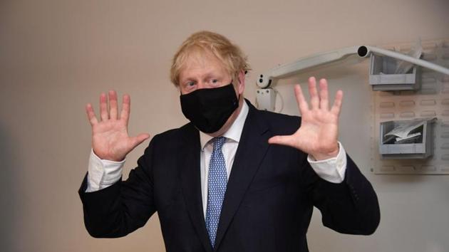Britain's Prime Minister Boris Johnson visits the Tollgate Medical Centre in Beckton, London. (REUTERS) Britain's Prime Minister Boris Johnson visits the Tollgate Medical Centre in Beckton, London. (REUTERS)