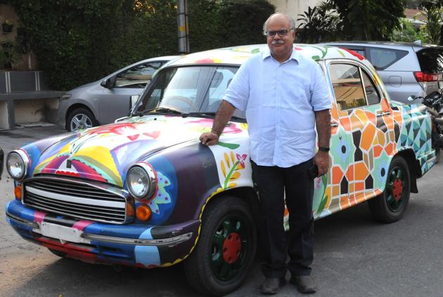 Advocate Ranjit Malhotra with his Ambassador car .(HT Photo)