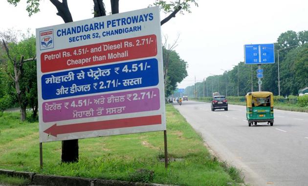 Mohali’s fuel dealers are also resentful about Chandigarh petrol pumps putting up boards advertising cheaper rates in Chandigarh against those in Mohali and Panchkula. (HT File Photo) Mohali’s fuel dealers are also resentful about Chandigarh petrol pumps putting up boards advertising cheaper rates in Chandigarh against those in Mohali and Panchkula. (HT File Photo)