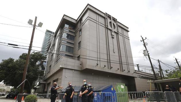 Police officers install barricades outside the Consulate General of China(AP Photo) Police officers install barricades outside the Consulate General of China(AP Photo)