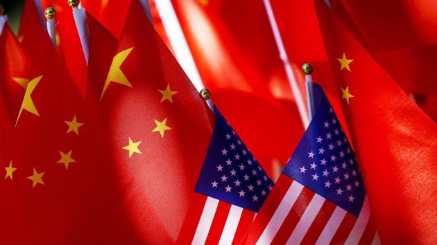 File photo of American flags displayed together with Chinese flags o(AP)