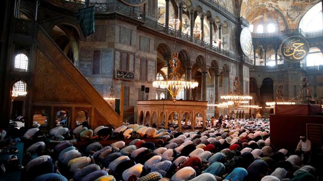 Worshippers attend afternoon prayers at Hagia Sophia Grand Mosque on July 24. On July 10, after a top Turkish court annulled Hagia Sophia’s status as a museum, Erdogan immediately turned it back into a mosque, which was a Christian Byzantine cathedral for 900 years before being seized by Ottoman conquerors and serving as a mosque until 1934. (Umit Bektas / REUTERS) Worshippers attend afternoon prayers at Hagia Sophia Grand Mosque on July 24. On July 10, after a top Turkish court annulled Hagia Sophia’s status as a museum, Erdogan immediately turned it back into a mosque, which was a Christian Byzantine cathedral for 900 years before being seized by Ottoman conquerors and serving as a mosque until 1934. (Umit Bektas / REUTERS)