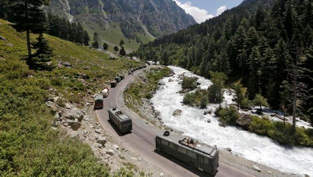 An Indian Army convoy moves along a highway leading to Ladakh, at Gagangeer in Kashmir's Ganderbal district. (REUTERS) An Indian Army convoy moves along a highway leading to Ladakh, at Gagangeer in Kashmir's Ganderbal district. (REUTERS)