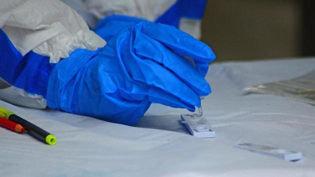 A health worker conducts Rapid Antigen Tests for coronavirus at CIDCO Urban Health Centre in Navi Mumbai on July 23. The current total of COVID-19 positive cases stands at 13,38,522 which includes 467,882 active cases, and 885,576 cured. (Bachchan Kumar/ HT Photo) A health worker conducts Rapid Antigen Tests for coronavirus at CIDCO Urban Health Centre in Navi Mumbai on July 23. The current total of COVID-19 positive cases stands at 13,38,522 which includes 467,882 active cases, and 885,576 cured. (Bachchan Kumar/ HT Photo)