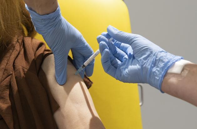 In this handout photo released by the University of Oxford a volunteer participates in the Covid-19 vaccine trial in Oxford, England on July 7, 2020. (AP) In this handout photo released by the University of Oxford a volunteer participates in the Covid-19 vaccine trial in Oxford, England on July 7, 2020. (AP)