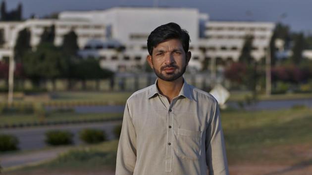 Wasim Abbas poses for a photo after talking with the Associated Press in Islamabad, Pakistan on July 22. “In the beginning, there was a fear of coronavirus and people were scared and they used to maintain a distance from others. Now people have started taking it easy. They don’t wear masks and they say death has to come one day, and when it comes, they will go to God, but they will not live any longer like this,” Abbas said, explaining mask-fatigue. (Anjum Naveed / AP) Wasim Abbas poses for a photo after talking with the Associated Press in Islamabad, Pakistan on July 22. “In the beginning, there was a fear of coronavirus and people were scared and they used to maintain a distance from others. Now people have started taking it easy. They don’t wear masks and they say death has to come one day, and when it comes, they will go to God, but they will not live any longer like this,” Abbas said, explaining mask-fatigue. (Anjum Naveed / AP)