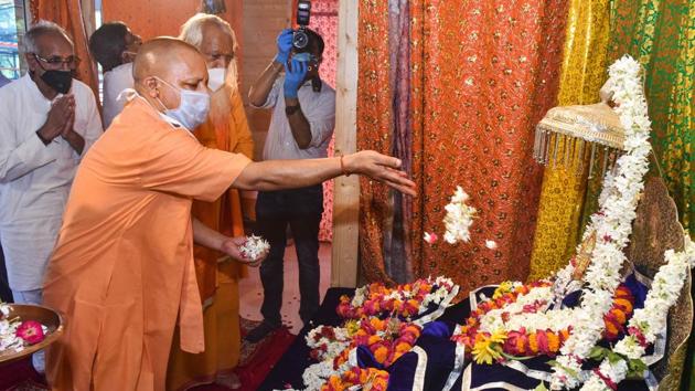 Uttar Pradesh chief minister Yogi Adityanath offers prayers to Lord Ram in the Ram Janmabhoomi campus in Ayodhya.(PTI Photo)