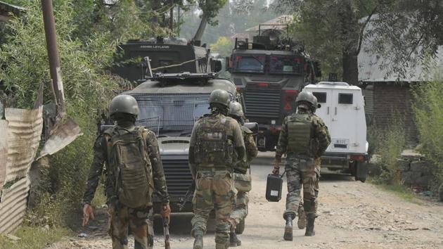 Security personnel seen near the site of an encounter at Ranbirgarh area, on the outskirts Srinagar, J&K , on Saturday, July 25, 2020.Two militants were killed in the encounter.(Waseem Andrabi / HT Photo) Security personnel seen near the site of an encounter at Ranbirgarh area, on the outskirts Srinagar, J&K , on Saturday, July 25, 2020.Two militants were killed in the encounter.(Waseem Andrabi / HT Photo)