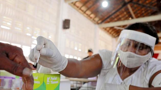 The election commission has been struggling to make arrangements for a free and fair poll due to the health risks caused by the Covid-19 pandemic.(Reuters file photo) The election commission has been struggling to make arrangements for a free and fair poll due to the health risks caused by the Covid-19 pandemic.(Reuters file photo)