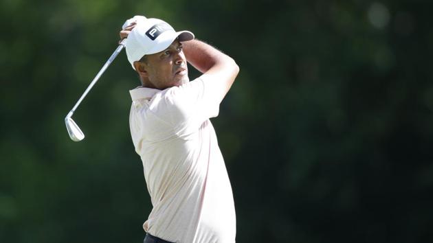 Arjun Atwal plays from the 9th tee during the third round of the Rocket Mortgage Classic golf tournament at Detroit Golf Club(USA TODAY Sports)