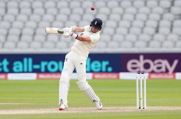 Cricket - Third Test - England v West Indies - Emirates Old Trafford, Manchester, Britain - July 25, 2020 England's Stuart Broad in action, as play resumes behind closed doors following the outbreak of the coronavirus disease (COVID-19) Martin Rickett/Pool via REUTERS (REUTERS)