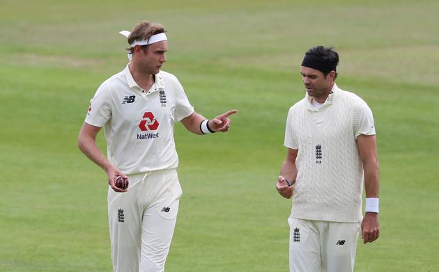 Cricket - Third Test - England v West Indies - Emirates Old Trafford, Manchester, Britain - July 25, 2020 England's Stuart Broad talks to James Anderson, as play resumes behind closed doors following the outbreak of the coronavirus disease (COVID-19) Martin Rickett/Pool via REUTERS (REUTERS)
