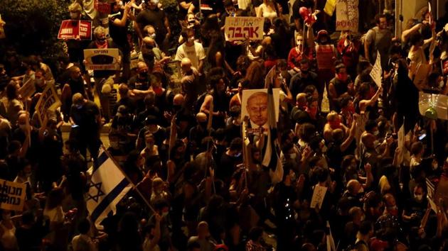 The protests came in the shadow of Netanyahu’s corruption trial which resumed this month. Hearings will start in January.(AP Photo)