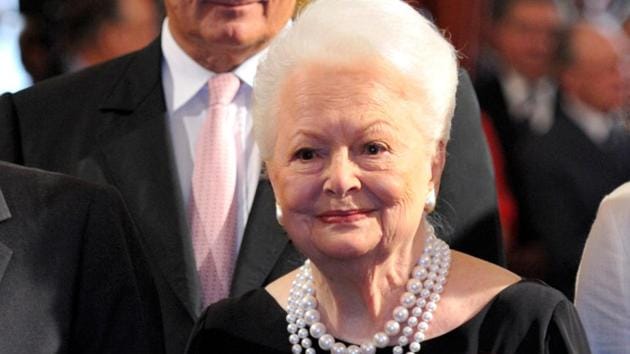 Olivia de Havilland looks on after she was awarded with the Legion d'honneur at the Elysee Palace, France September 9, 2010. (REUTERS/Philippe Wojazer/File Photo)