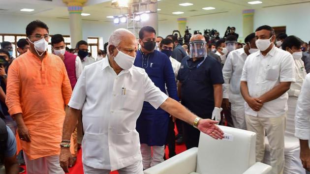 Karnataka Chief Minister BS Yediyurappa and other leaders during a programme in Bengaluru on Monday to mark the completion of one year by the BJP government in the state.(PTI)