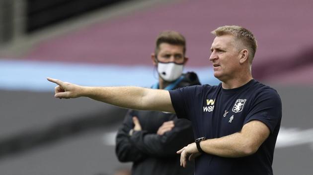 Aston Villa's head coach Dean Smith gestures to his players during the English Premier League soccer match between West Ham United and Aston Villa.(AP)
