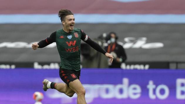 Aston Villa's Jack Grealish celebrates after scoring the opening goal of the game during the English Premier League soccer match between West Ham United and Aston Villa at the London Stadium in London, Sunday, July 26, 2020. (Andy Rain/Pool via AP)(AP)