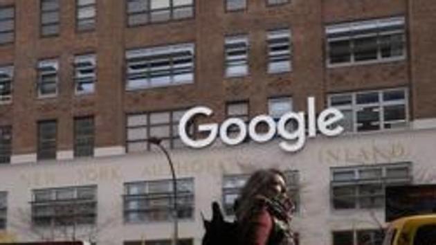 In this file photo, a woman walks past Google offices in New York. (AP File photo) In this file photo, a woman walks past Google offices in New York. (AP File photo)