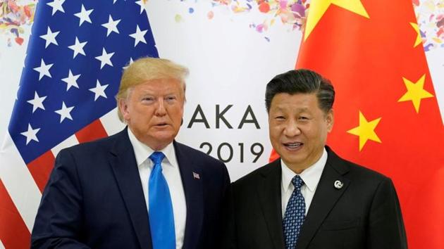 US President Donald Trump and China's President Xi Jinping pose for a photo ahead of their bilateral meeting during the G20 leaders summit in Osaka, Japan. (REUTERS) US President Donald Trump and China's President Xi Jinping pose for a photo ahead of their bilateral meeting during the G20 leaders summit in Osaka, Japan. (REUTERS)