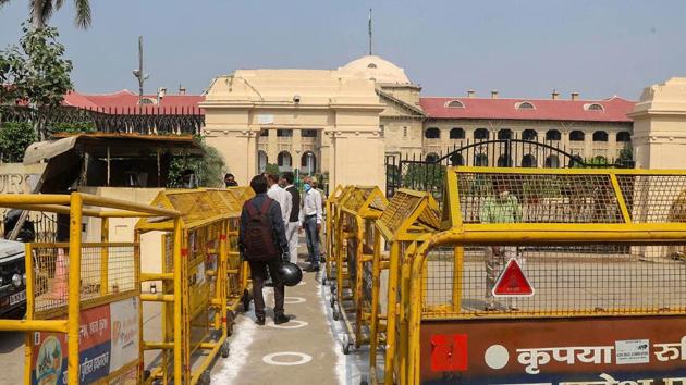 Prayagraj: People undergo thermal screening outside Allahabad High Court.(PTI)