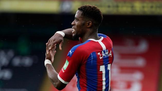 Soccer Football - Premier League - Crystal Palace v Tottenham Hotspur - Selhurst Park, London, Britain - July 26, 2020 Crystal Palace's Wilfried Zaha reacts, as play resumes behind closed doors following the outbreak of the coronavirus disease (COVID-19) Pool via REUTERS/Will Oliver(Pool via REUTERS)