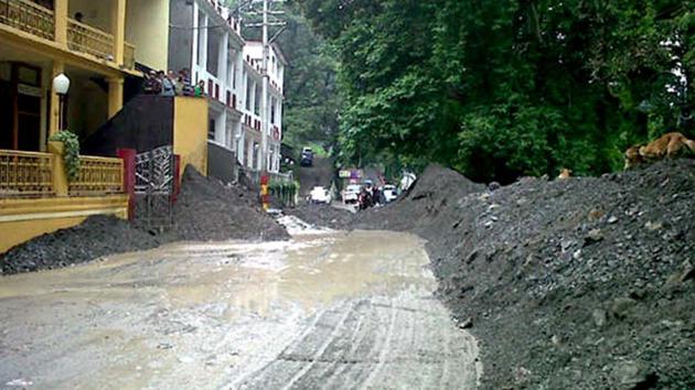 Nainital's Mall Road was filled with debris after a sudden burst of heavy rain in the region on July 13, 2020.(HT File Photo)