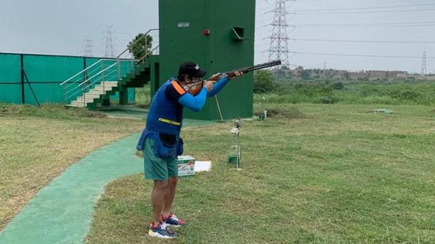Skeet shooter Mairaj Ahmad Khan training at the Karni Singh Shooting range. (HT Photo) Skeet shooter Mairaj Ahmad Khan training at the Karni Singh Shooting range. (HT Photo)