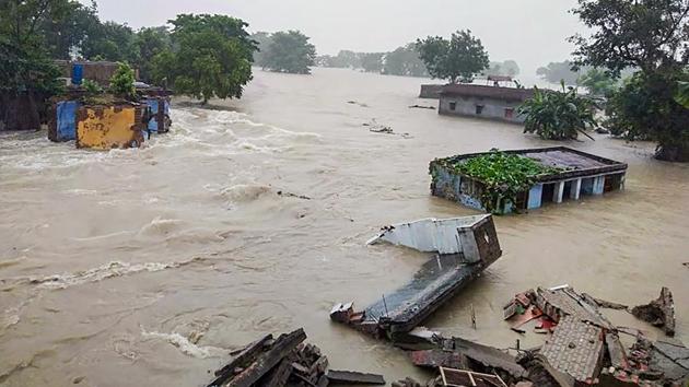 Houses are submerged following heavy rain in Bihar’s Gopalganj district on July 27. Bihar Chief Minister Nitish Kumar on July 27 said that engineers of Water Resources Department in the state should be alert in the regions where embankments are under pressure from floodwaters. The CM said embankments should be subjected to round-the-clock monitoring to keep the flood situation in check. (PTI)