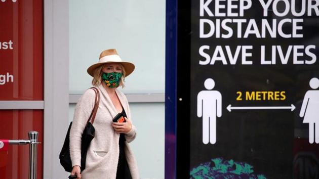 A passenger wearing a protective mask is pictured after arriving at Birmingham Airport following the outbreak of the coronavirus disease (Covid-19) in Birmingham, Britain.(Reuters)