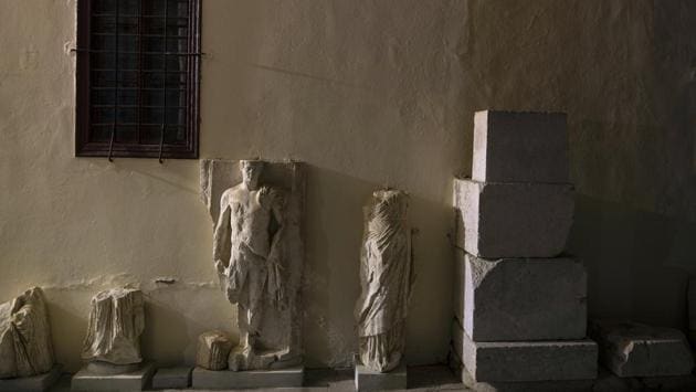 Ancient marble statues are seen outside the Archaeological Museum of Epidaurus next the ancient theatre of the site. (AP Photo/Petros Giannakouris) Ancient marble statues are seen outside the Archaeological Museum of Epidaurus next the ancient theatre of the site. (AP Photo/Petros Giannakouris)