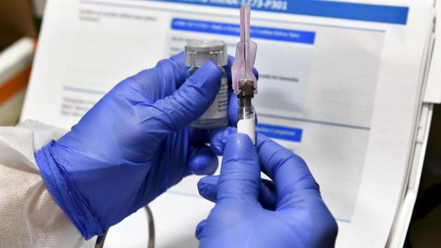 Final-stage testing of the vaccine, developed by the National Institutes of Health and Moderna Inc., began on Monday with volunteers at numerous sites around the US given either a real dose or a dummy without being told which. (AP) Final-stage testing of the vaccine, developed by the National Institutes of Health and Moderna Inc., began on Monday with volunteers at numerous sites around the US given either a real dose or a dummy without being told which. (AP)