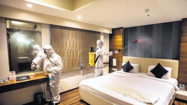 Staff of a hotel sanitise a room at Deccan in Pune on Tuesday. Under the new orders of Maharashtra government, hotels and other entities providing accommodation services like lodges and guest houses outside containment zones to operate from July 8 at 33% of their capacity.(PRATHAM GOKHALE/HT) Staff of a hotel sanitise a room at Deccan in Pune on Tuesday. Under the new orders of Maharashtra government, hotels and other entities providing accommodation services like lodges and guest houses outside containment zones to operate from July 8 at 33% of their capacity.(PRATHAM GOKHALE/HT)