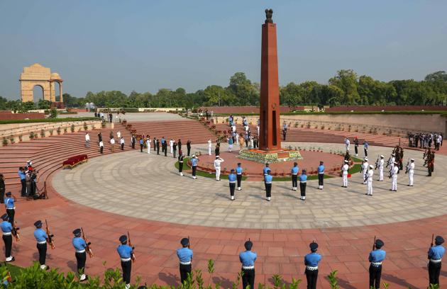 Defence Minister Rajnath Singh pays tribute to the martyrs of Kargil war on the occasion of Kargil Vijay Diwas, at National War Memorial in New Delhi. The 20 soldiers who died in Galwan Valley will have their names inscribed on the National War Memorial.(PTI)