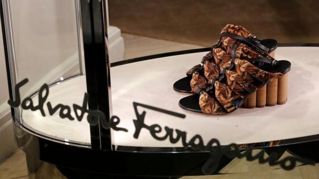 FILE PHOTO: A pair of shoes of Italian luxury shoemaker Salvatore Ferragamo is displayed in the window of the company's store in Zurich, Switzerland, April 25, 2019.(REUTERS/Arnd Wiegmann)