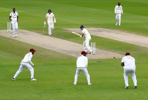 Cricket - Third Test - England v West Indies - Emirates Old Trafford, Manchester, Britain - July 25, 2020 England's James Anderson is caught out by West Indies' Rahkeem Cornwall bowled by Jason Holder, as play resumes behind closed doors following the outbreak of the coronavirus disease (COVID-19) Michael Steele/Pool via REUTERS (REUTERS)