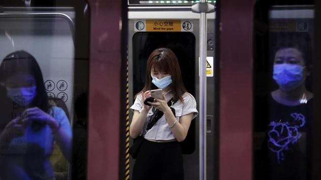Commuters wearing face masks as a precaution against coronavirus while riding in a subway train in Beijing, on July 29. According to an AFP report, a fresh Beijing case reported on July 27 was linked to an asymptomatic patient who had travelled from Dalian - the first new local case since a cluster in the capital was brought under control in early July. (Andy Wong / AP) Commuters wearing face masks as a precaution against coronavirus while riding in a subway train in Beijing, on July 29. According to an AFP report, a fresh Beijing case reported on July 27 was linked to an asymptomatic patient who had travelled from Dalian - the first new local case since a cluster in the capital was brought under control in early July. (Andy Wong / AP)