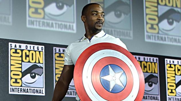 Anthony Mackie poses with the Captain America shield.