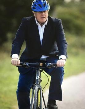 UK Prime Minister Boris Johnson, 56, a cycling enthusiast, was seen riding a Hero Viking Pro bike to Canalside Heritage Centre at Beeston in Nottingham, central England, on Tuesday as he launched a £2 billion (Rs 19,392 crore) cycling and walking drive, which is part of the UK government’s anti-obesity strategy to combat Covid-19.(Twitter)