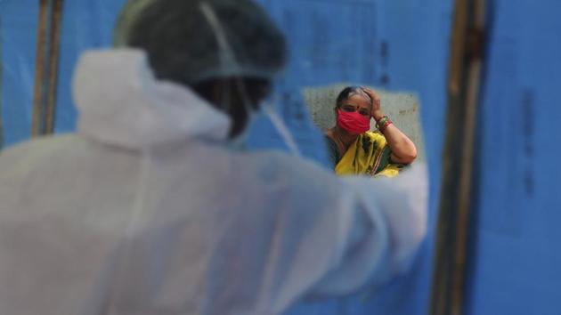 A woman waits to give her sample for coronavirus test at a government health centre in Hyderabad on July 27. According to data analysed by HT, Maharashtra stands worst hit among the states with Covid-19, followed by Tamil Nadu, Delhi and Andhra Pradesh. (Mahesh Kumar A / AP) A woman waits to give her sample for coronavirus test at a government health centre in Hyderabad on July 27. According to data analysed by HT, Maharashtra stands worst hit among the states with Covid-19, followed by Tamil Nadu, Delhi and Andhra Pradesh. (Mahesh Kumar A / AP)