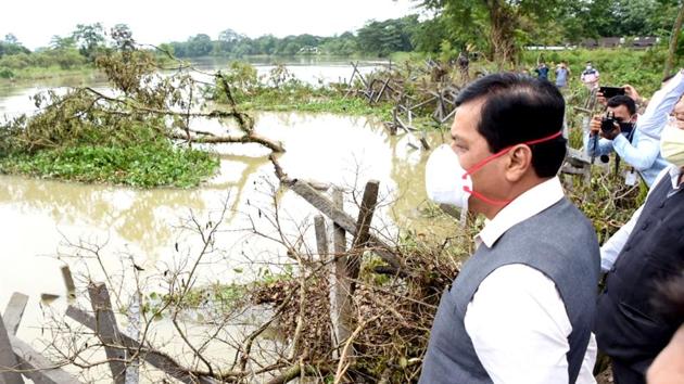 Assam chief minister Sarbananda Sonowal inspecting Charikoria river bank erosion site at Dhakuakhana in Lakhimpur district of Assam on Wednesday.(ANI Photo) Assam chief minister Sarbananda Sonowal inspecting Charikoria river bank erosion site at Dhakuakhana in Lakhimpur district of Assam on Wednesday.(ANI Photo)