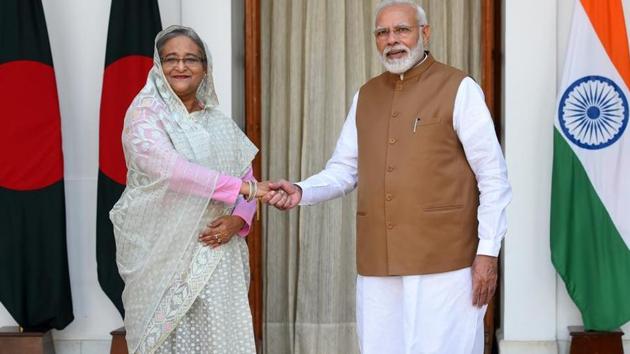 Prime Minister Narendra Modi greets Bangladesh Prime Minister Sheikh Hasina before their bilateral talk, Hyderabad House, New Delhi, October 5, 2019(Mohd Zakir/HT PHOTO)