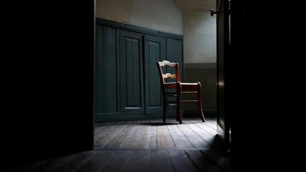 A chair is seen inside the Auberge Ravoux, where Van Gogh spent his last weeks in Auvers-sur-Oise, on July 29. The painting ‘Tree Roots’ in vibrant blue and green is believed to be his last work, created on the day he shot himself--July 27, 1890. He died two days later. (Christian Hartmann / REUTERS) A chair is seen inside the Auberge Ravoux, where Van Gogh spent his last weeks in Auvers-sur-Oise, on July 29. The painting ‘Tree Roots’ in vibrant blue and green is believed to be his last work, created on the day he shot himself--July 27, 1890. He died two days later. (Christian Hartmann / REUTERS)