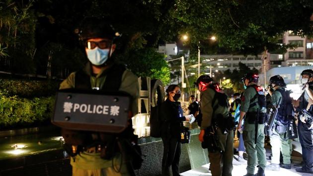 Pro-democracy demonstrators are searched by riot police during a protest to mark the first anniversary of an attack in a train station by an armed crowd wearing white shirts, demanding justice for the victims of violence and broader freedoms, at a shopping mall in Hong Kong's Yuen Long, China.(REUTERS) Pro-democracy demonstrators are searched by riot police during a protest to mark the first anniversary of an attack in a train station by an armed crowd wearing white shirts, demanding justice for the victims of violence and broader freedoms, at a shopping mall in Hong Kong's Yuen Long, China.(REUTERS)