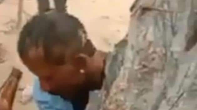 Singh said a man can be seen tied to a tree in the viral video and some people can be seen beating him, cutting his hair and making him drink some liquid.(Twitter/@s3nkul)